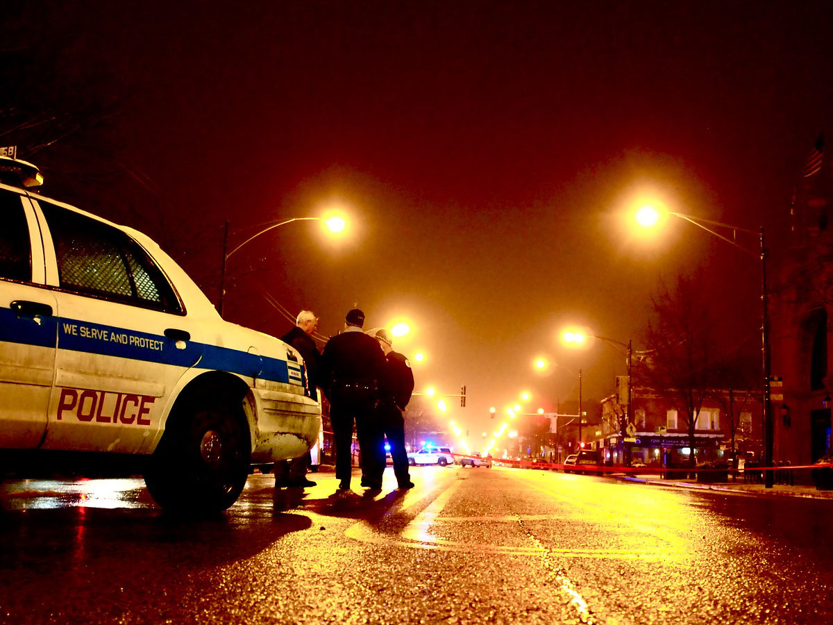 Police at crime scene in Chicago. Photo by J. Knecht on Flickr.