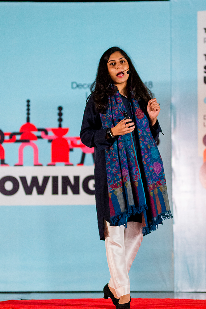 Mehreen onstage delivering a TEDx talk in Lahore