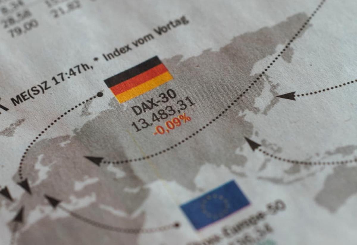 Flags of Germany, EU and France in newspaper