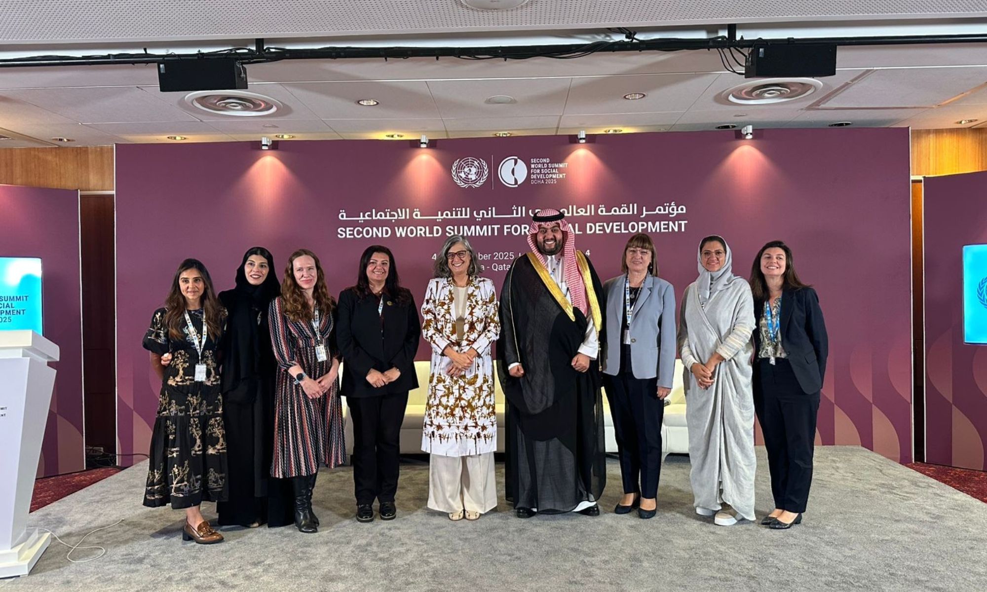 Flavia with delegates in Doha