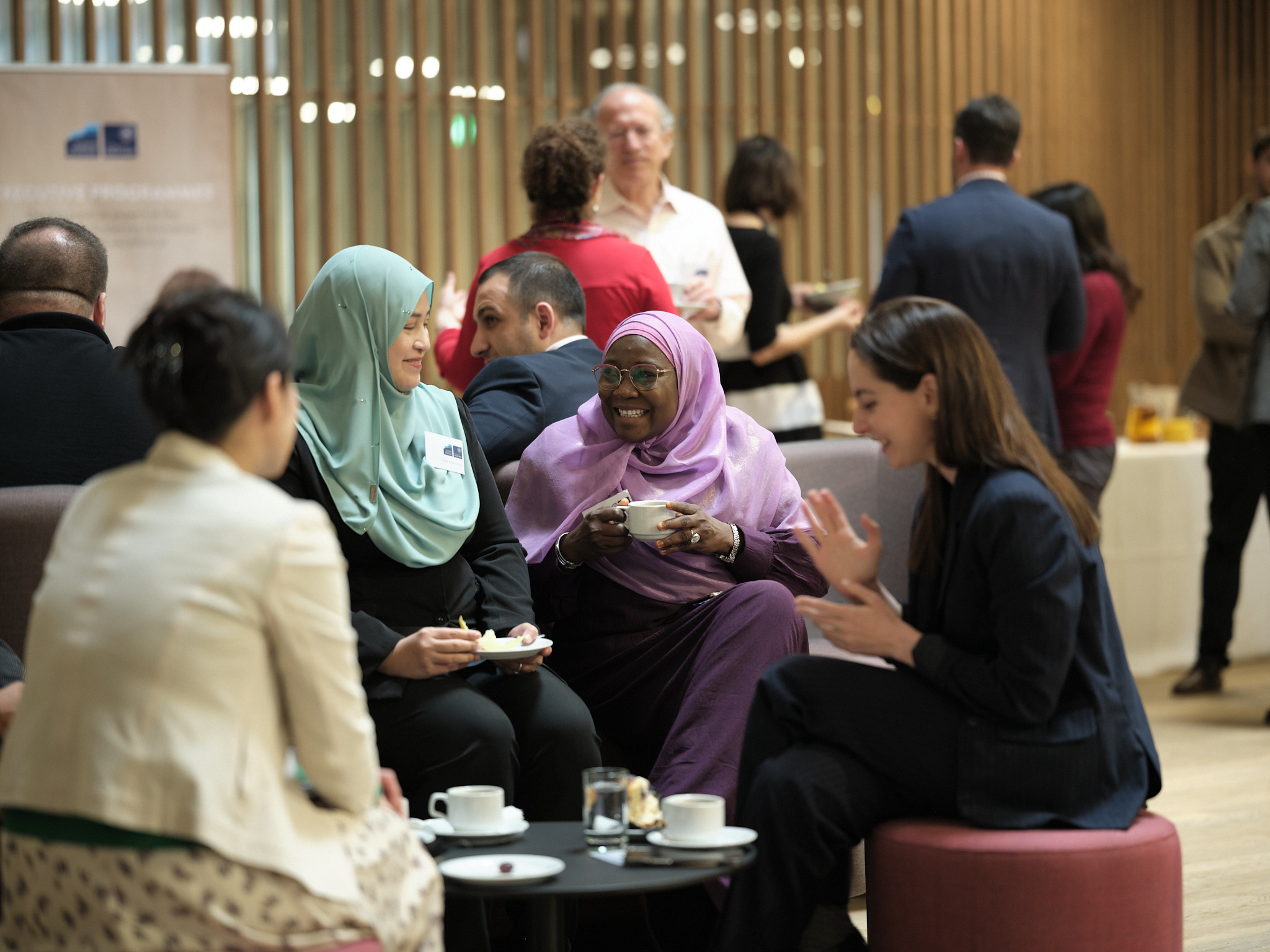 Women talking and drinking tea