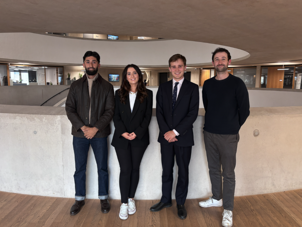 Political Leadership Scholars Raees Khan, Tara Porter McEvoy and Jason Bunting pictured with alumnus Keir Mather MP
