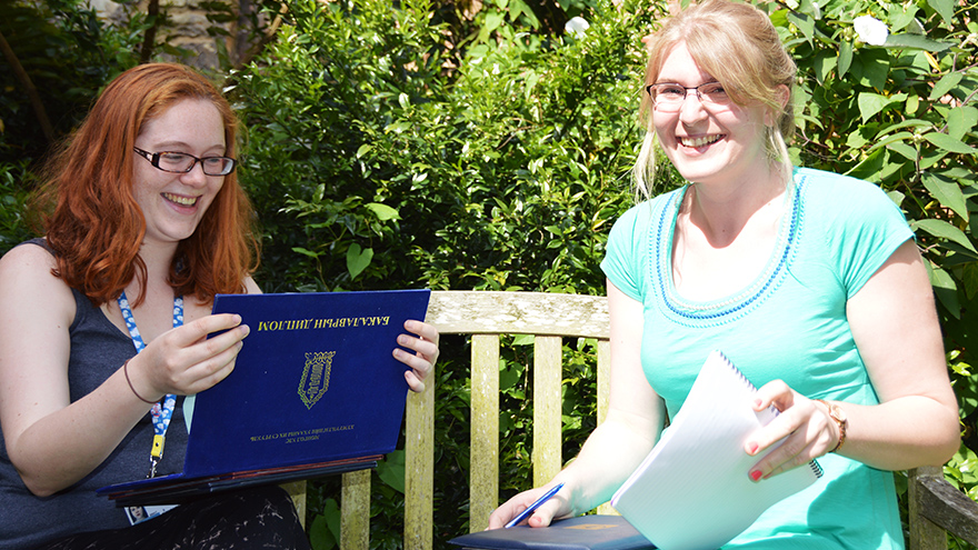 Sarah and Emily, our hard-working Admissions Team, look at some transcripts from prospective students.