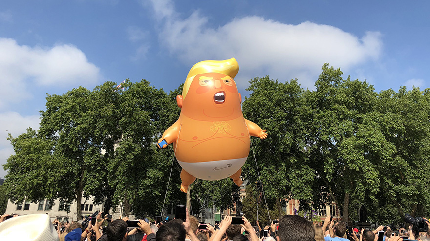 The Trump Baby blimp rises over London’s Parliament Square.