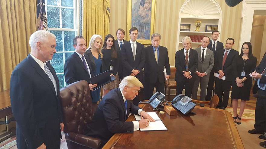 Donald Trump signs Executive Orders, January 2017. Source: Wikimedia Commons