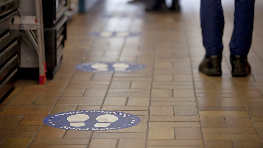 Social distancing signs in London
