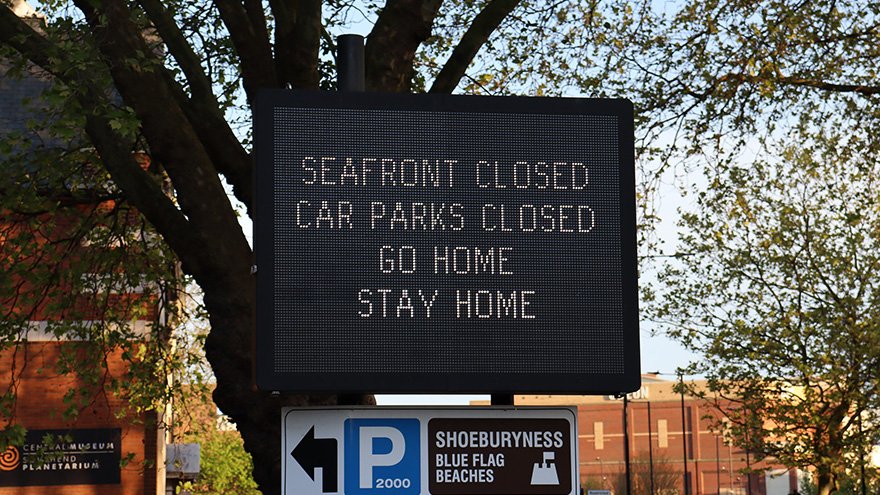 closed sign near beach