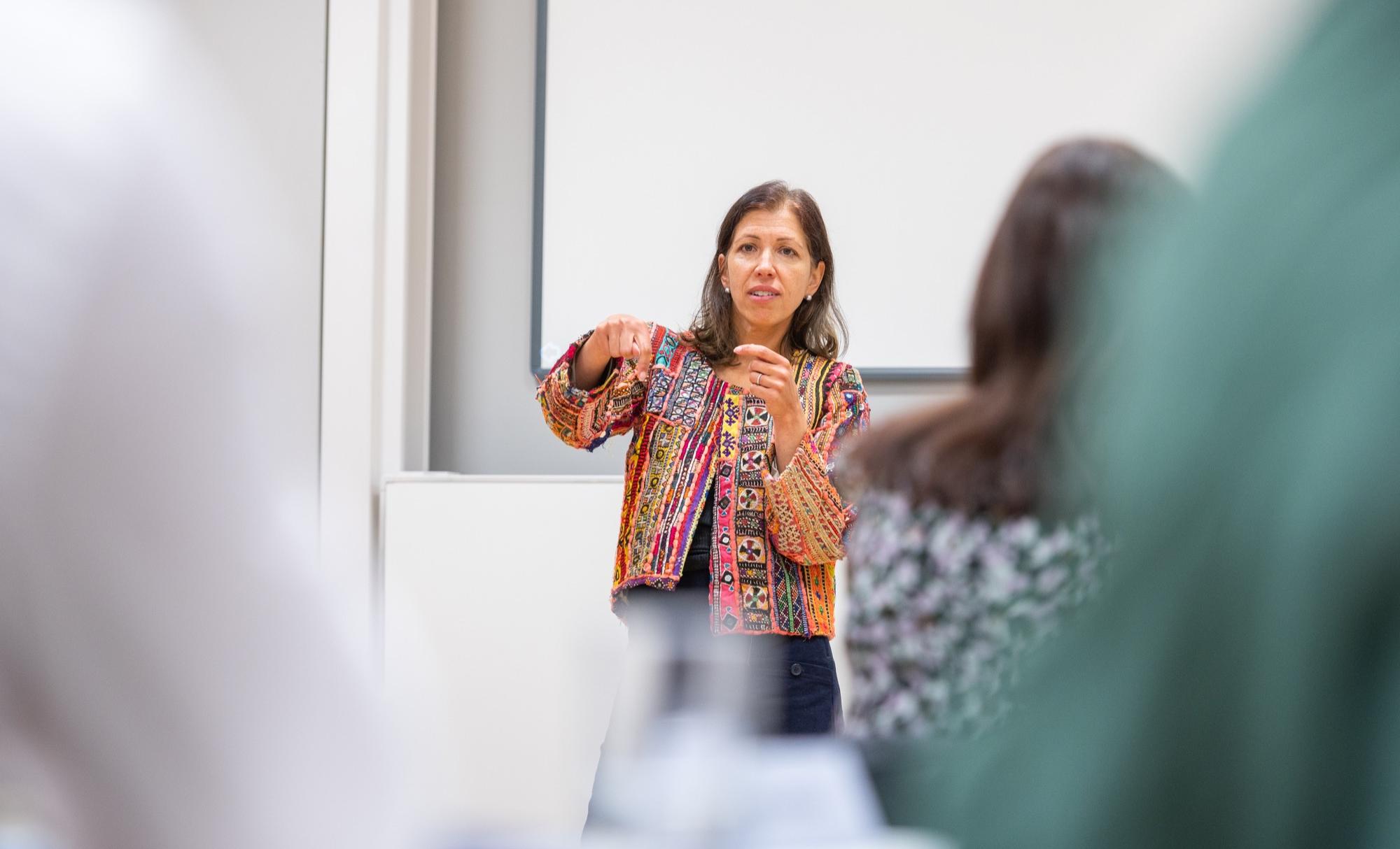 Faculty member Maya Tudor teaching a class