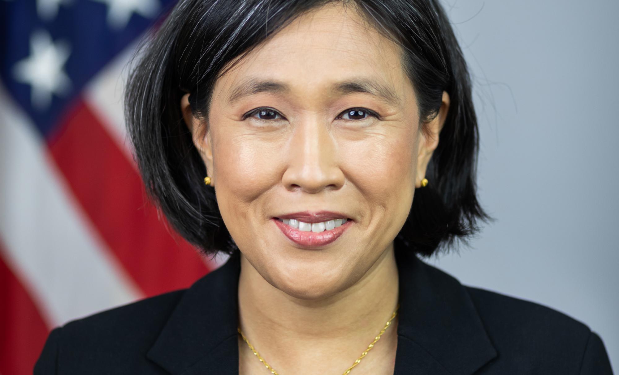 Photo of Ambassador Katherine Tai against the United States flag