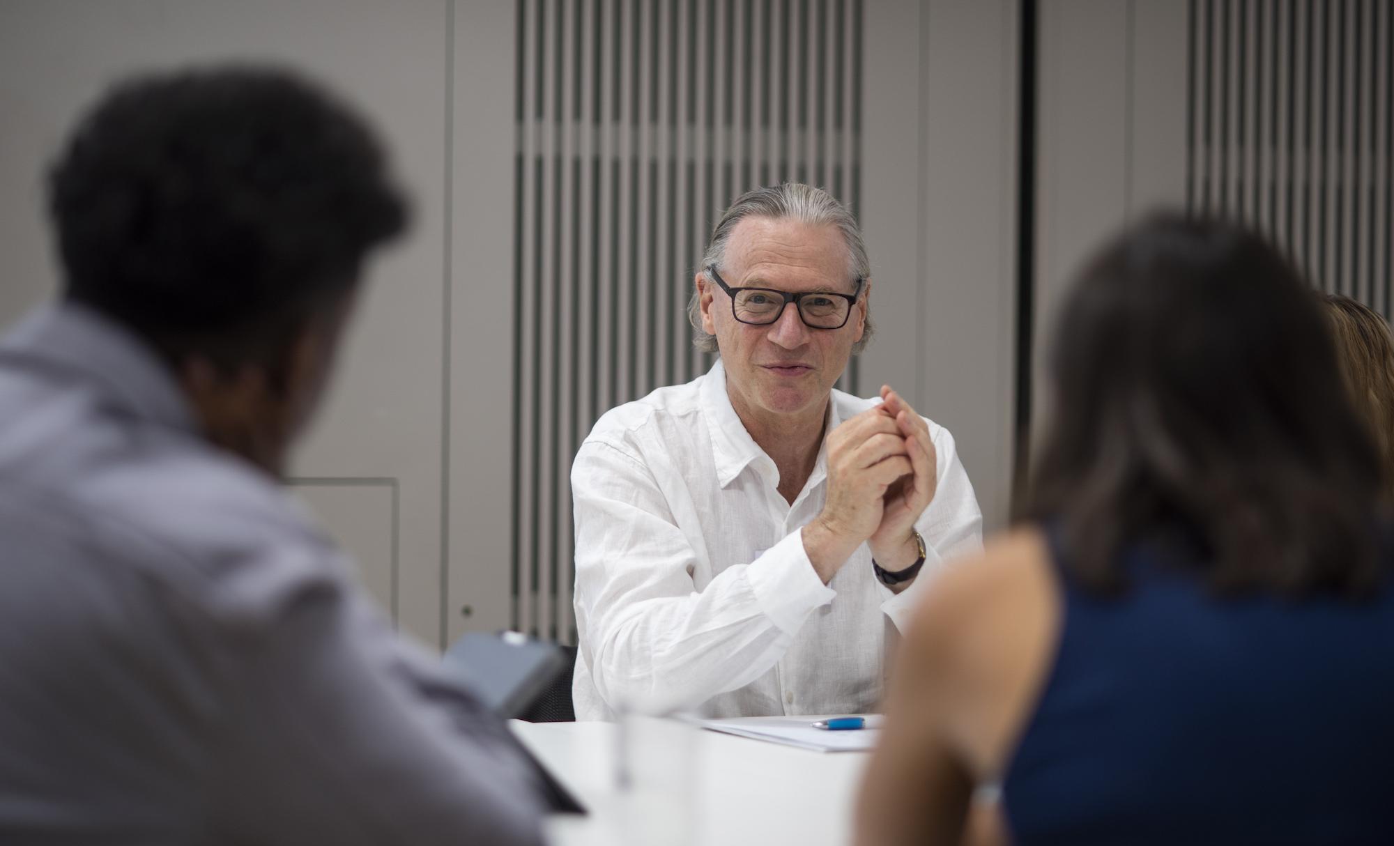 Jo Wolff pictured talking to students