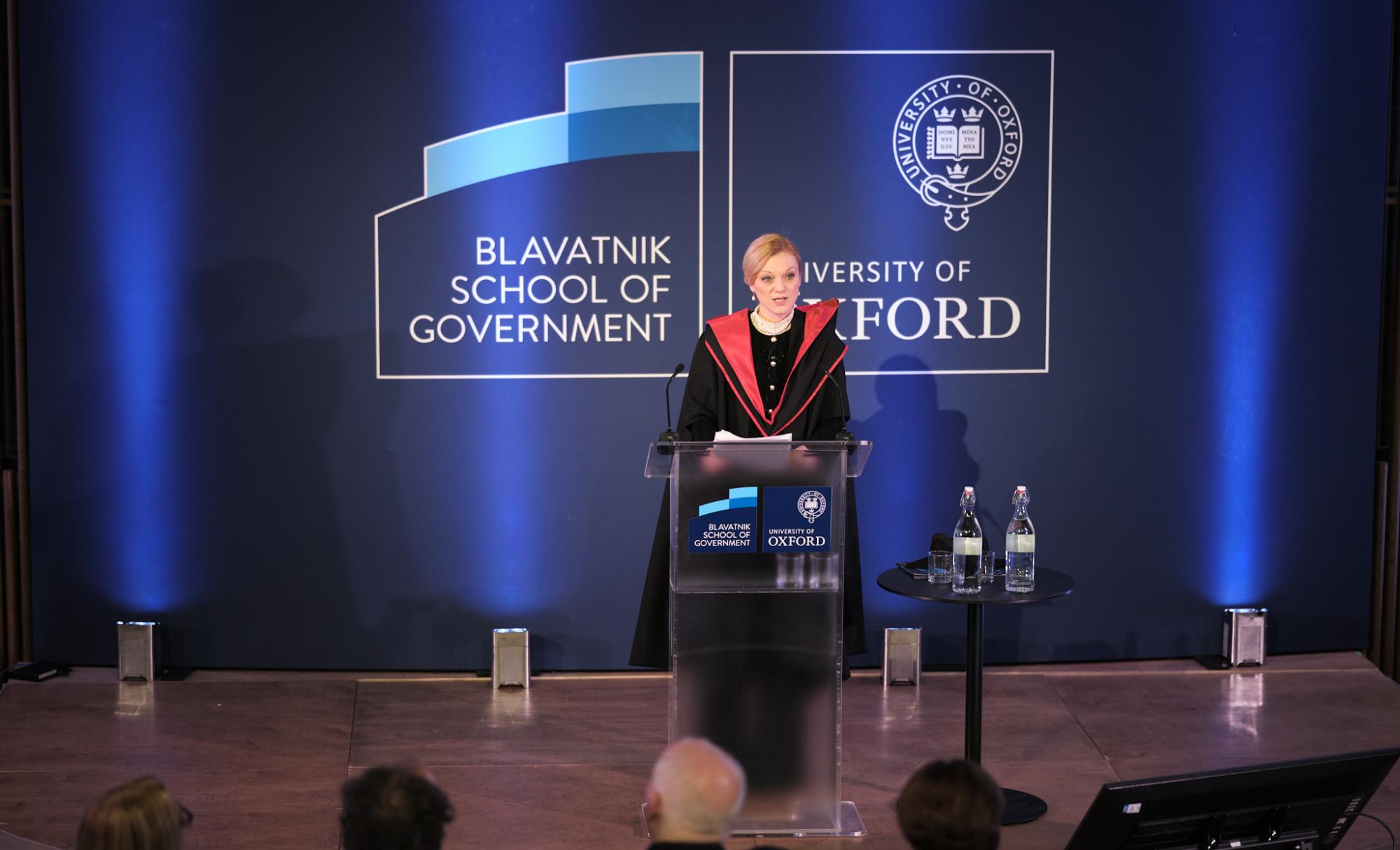 Janina stands at the podium for her inaugural lecture