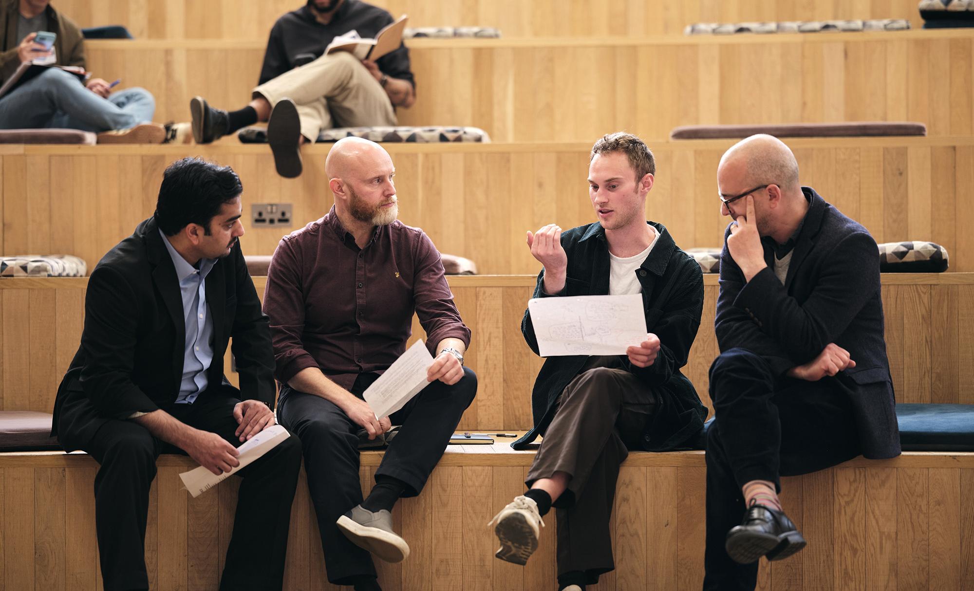 Group of course participants engaging in discussion