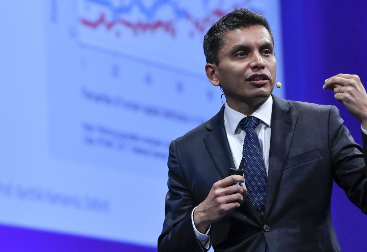 Karthik Ramanna speaking at a conference