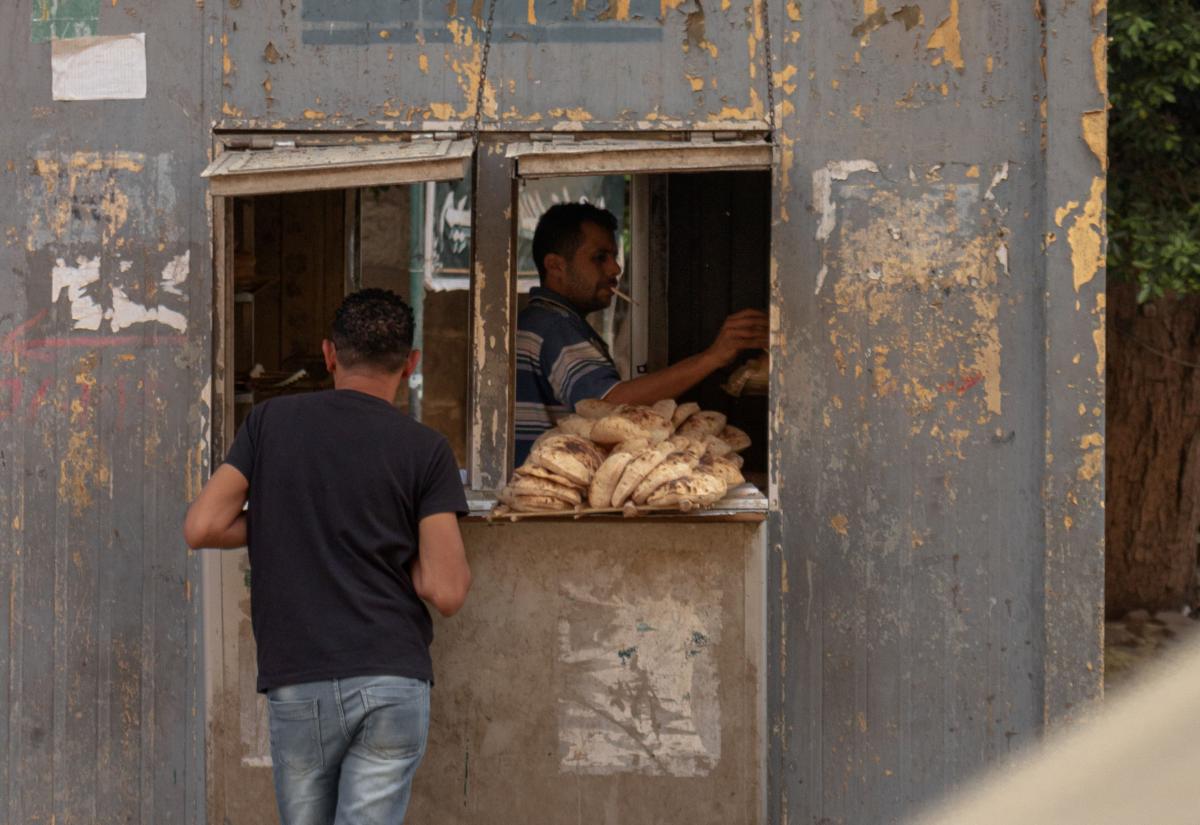 Man selling bread in Cairo, Egypt