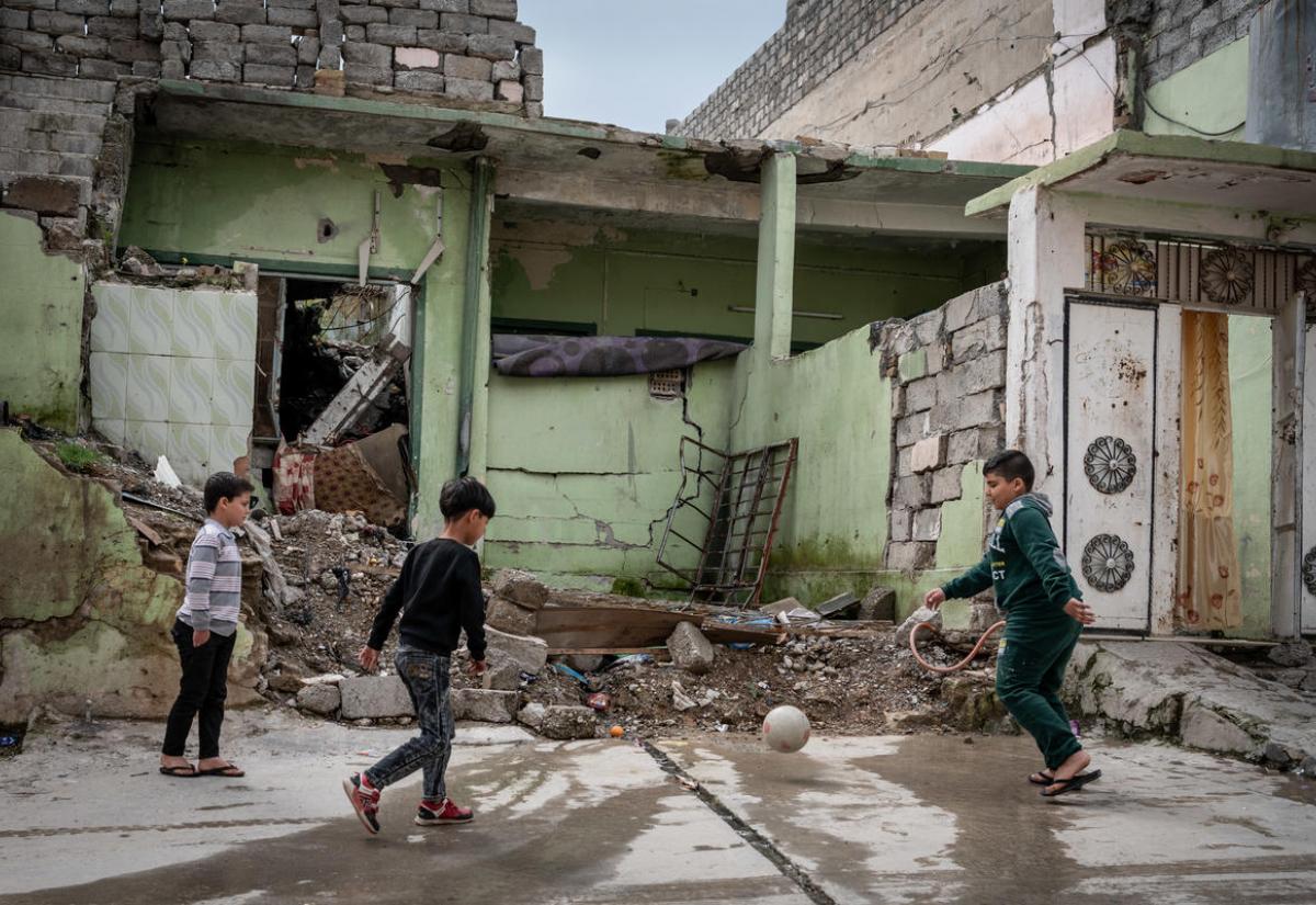 Children playing football in Iraq