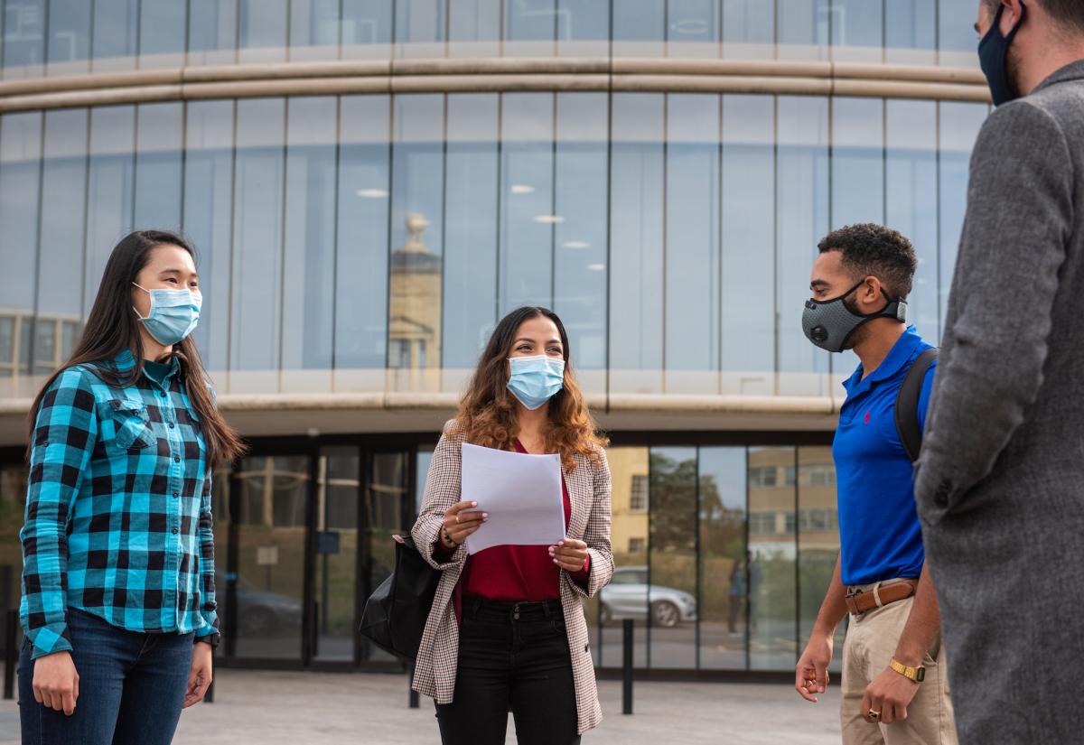 Students in front of the Blavatnik School building
