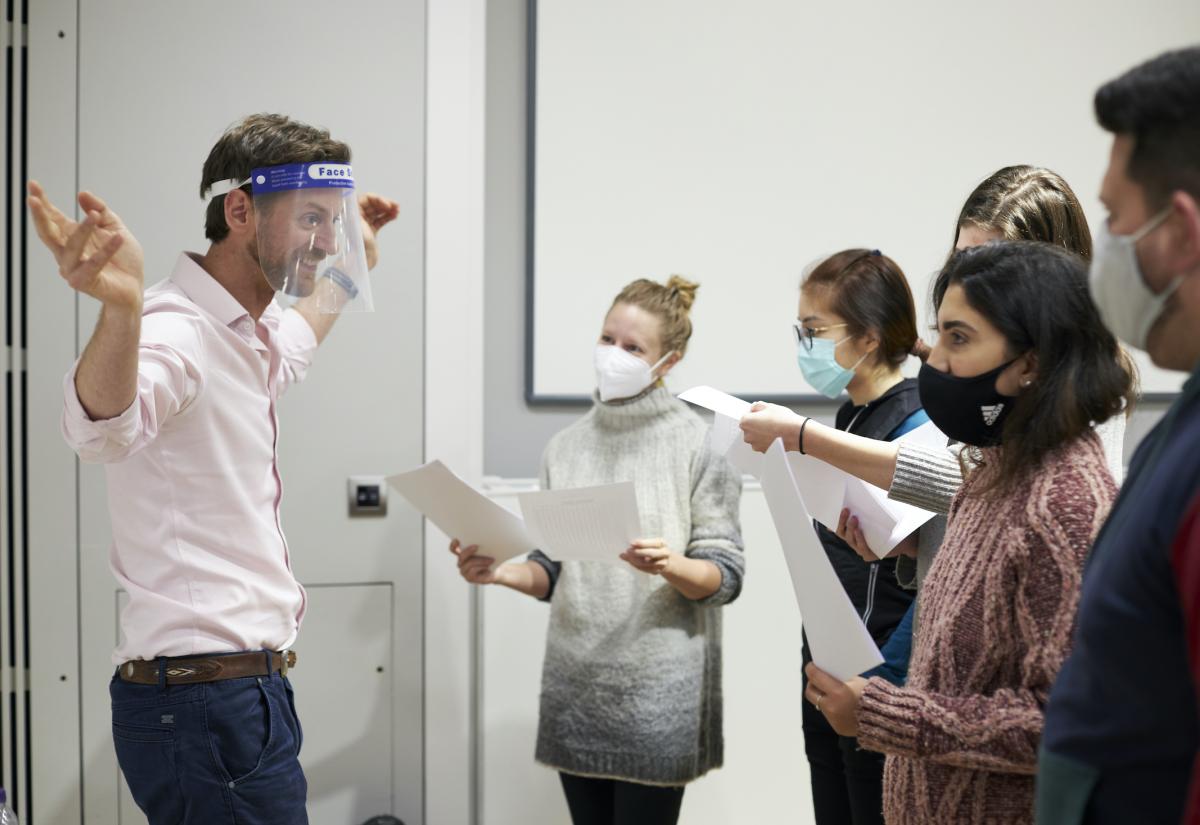 Dr Adam Webster and MPP students in masks 