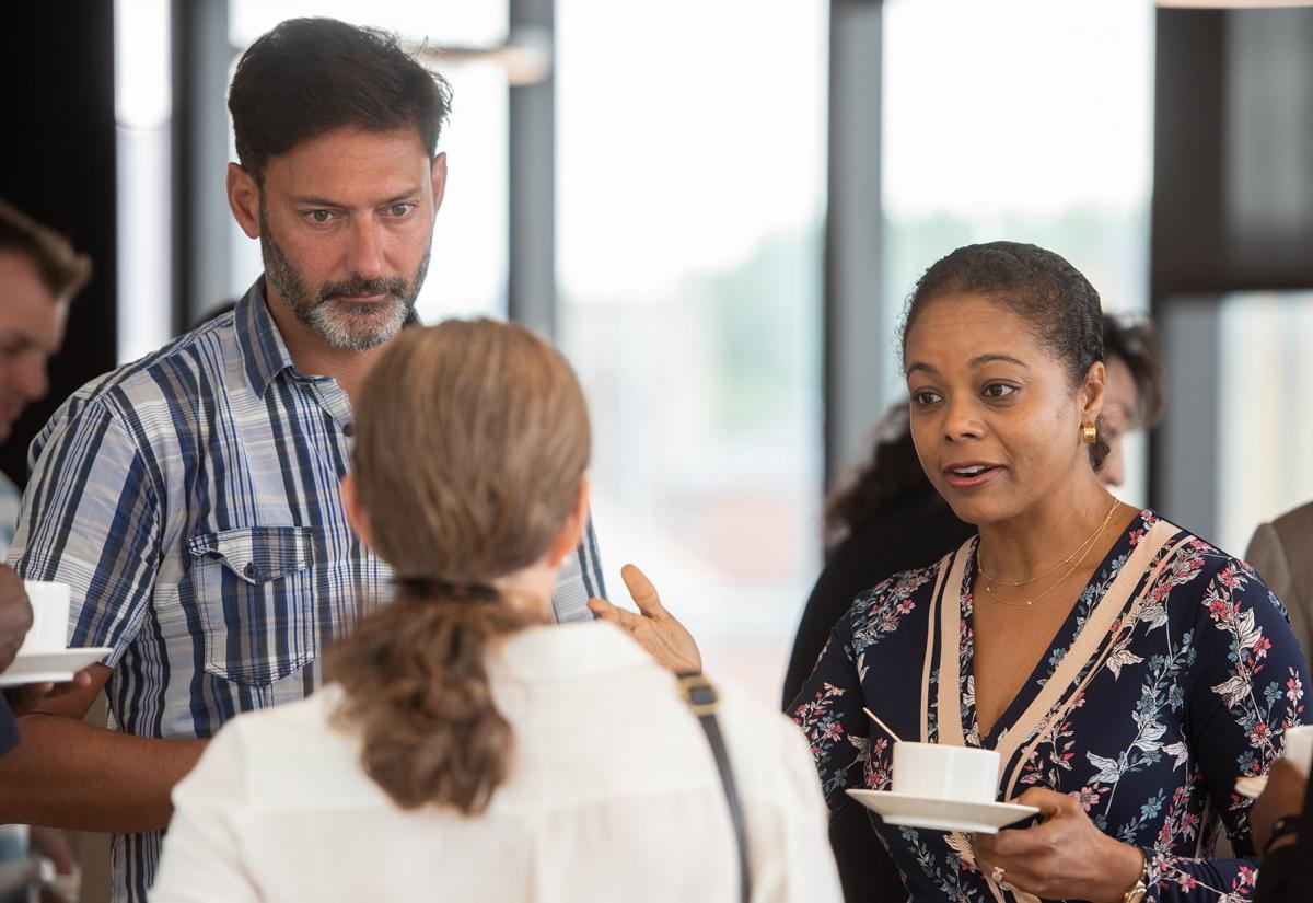 Executive Public Leaders Programme participants talking in a group