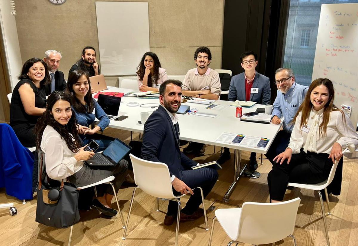 Team all sitting at a table