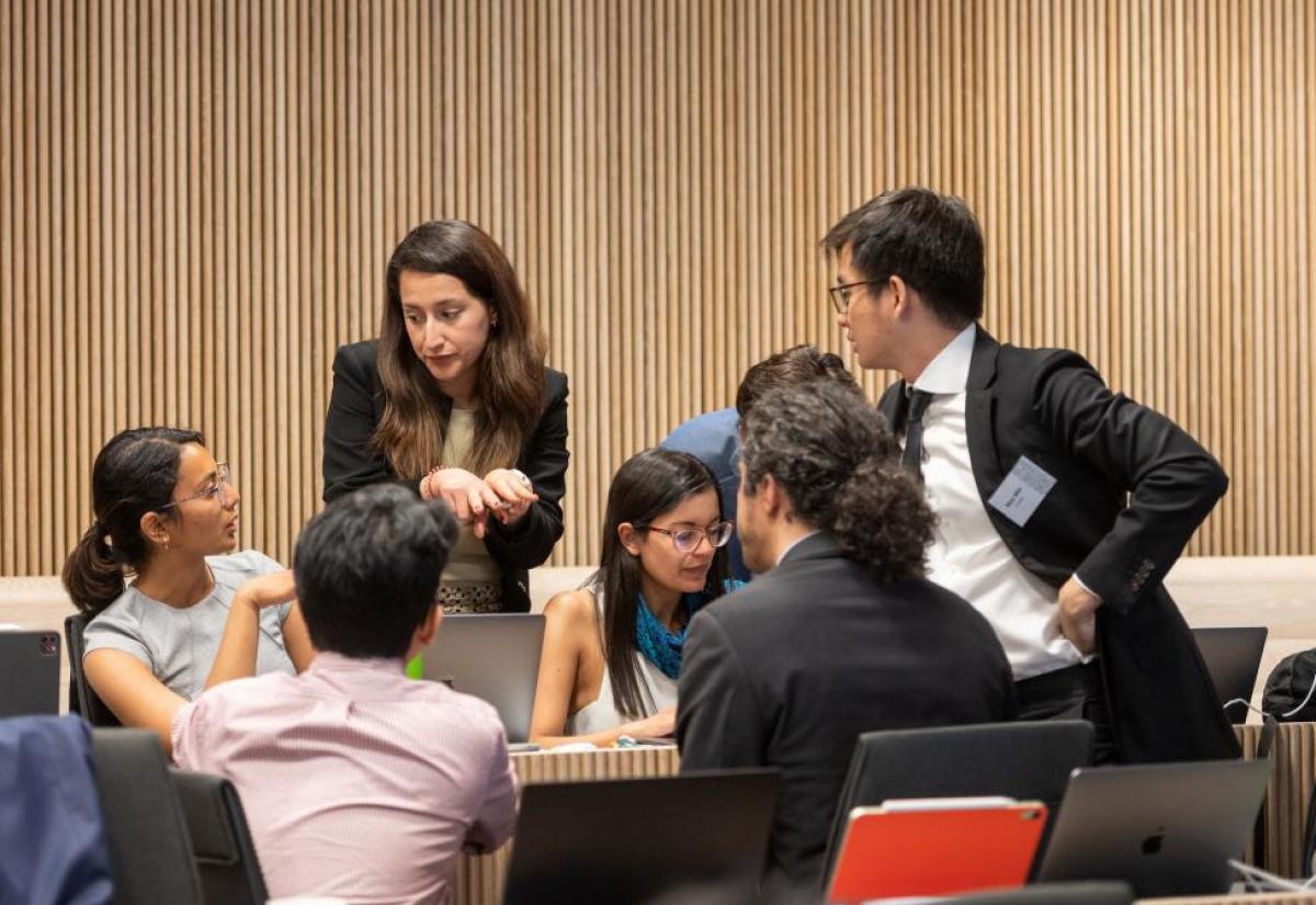 Seven students in a discussion group