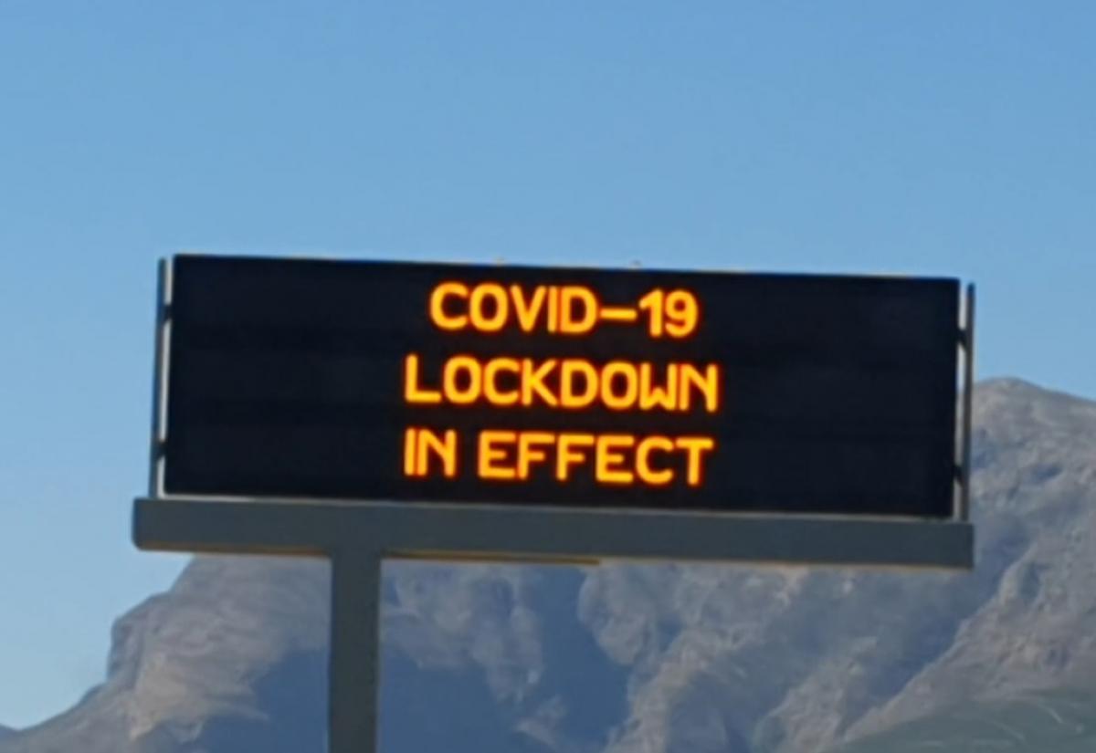 Covid-19 lockdown in effect sign