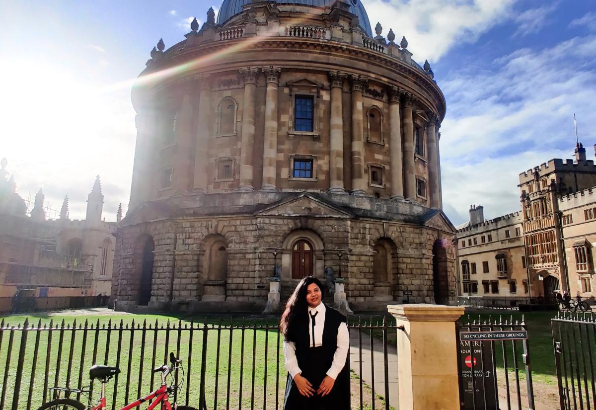 Ayushi Khare in front of the Radcliffe Camera