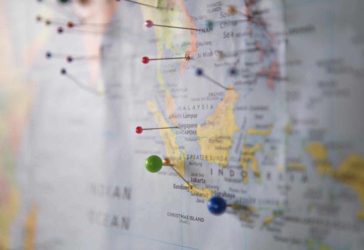 World map with pins on 