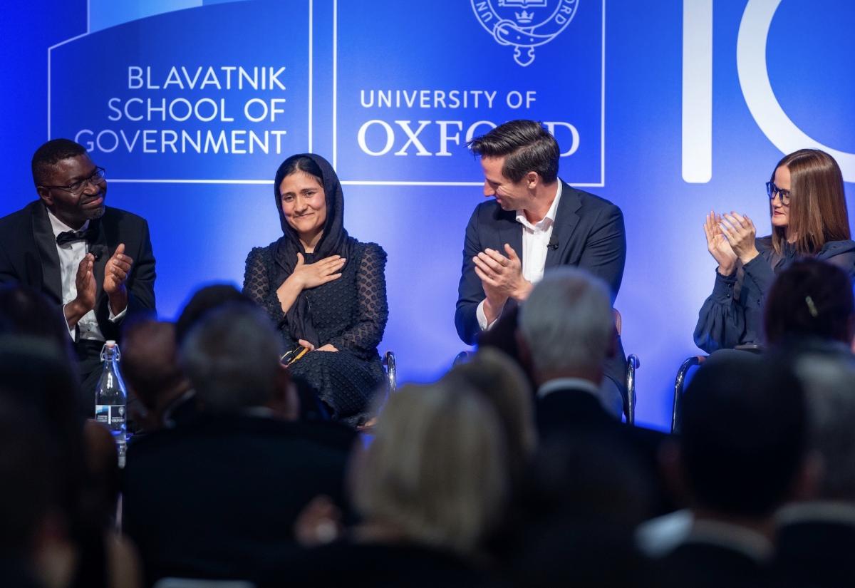 Left to right: Dapo Akande applauds Shabana Basij-Rasikh, as does Byron Fay and Soledad Nunez