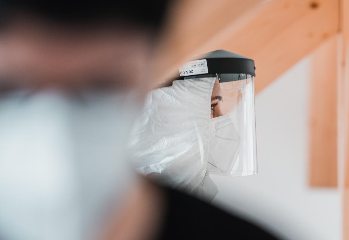 Doctor in face mask and PPE