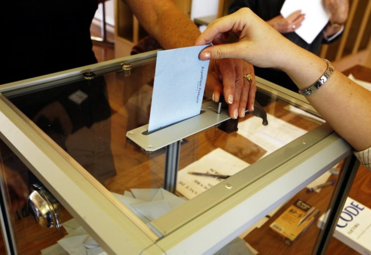 Voting booth with person voting