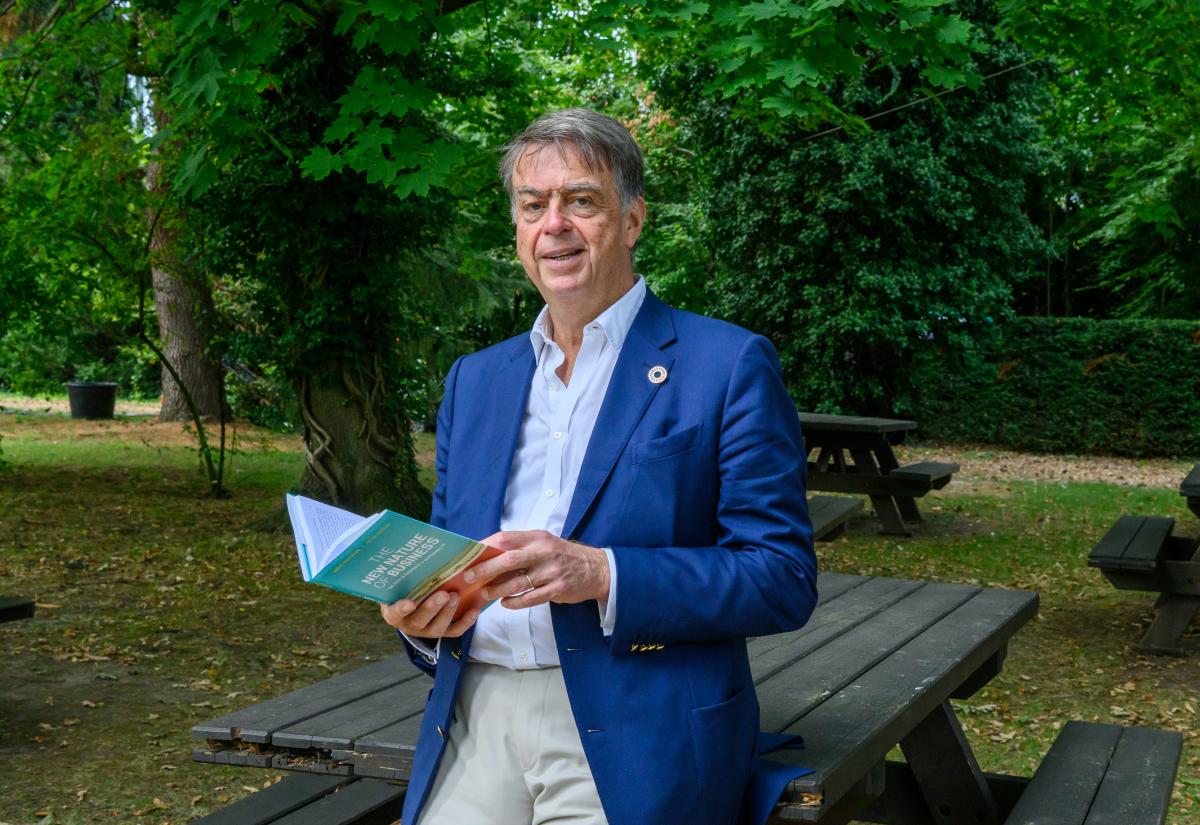 Andre Hoffman with his book