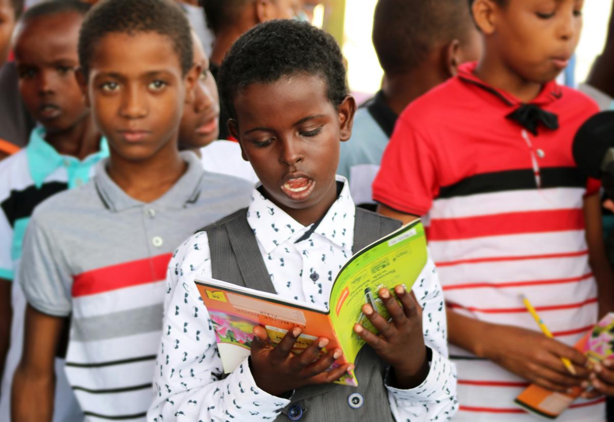 Picture of a Somalian child reading