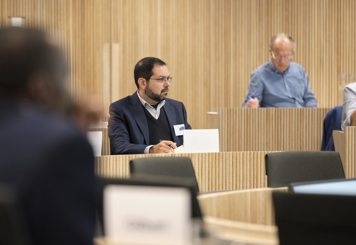 A university classroom with people concentrating