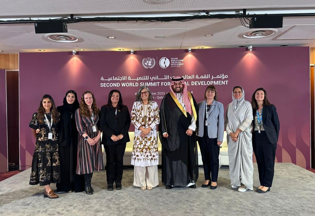 Flavia with delegates in Doha