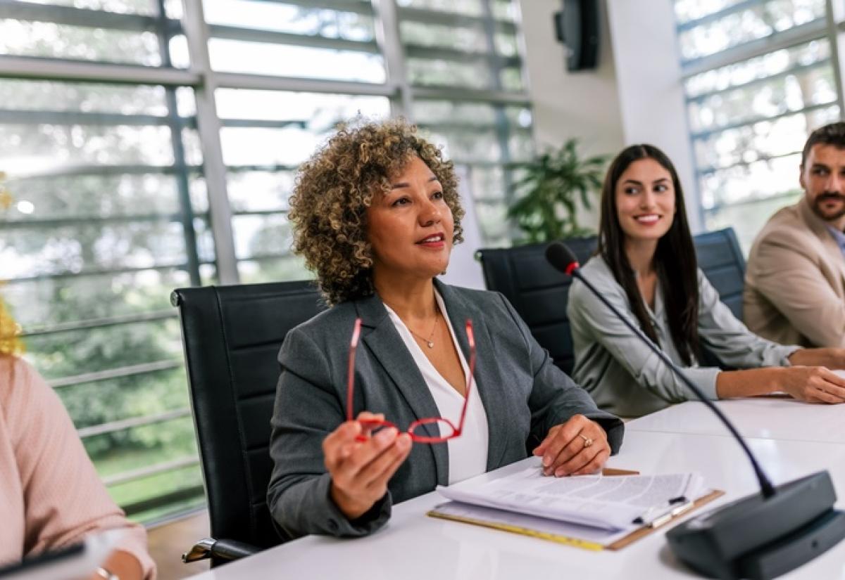 Women presiding a professional meeting