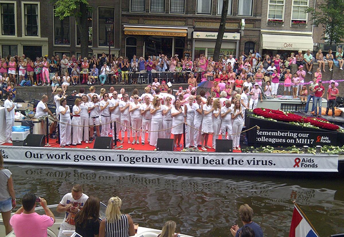 The first boat of Amsterdam Gay Pride Parade 2014 in memory of the MH17 victims, 193 of which were from the Netherlands. Image source: Manjit Nath