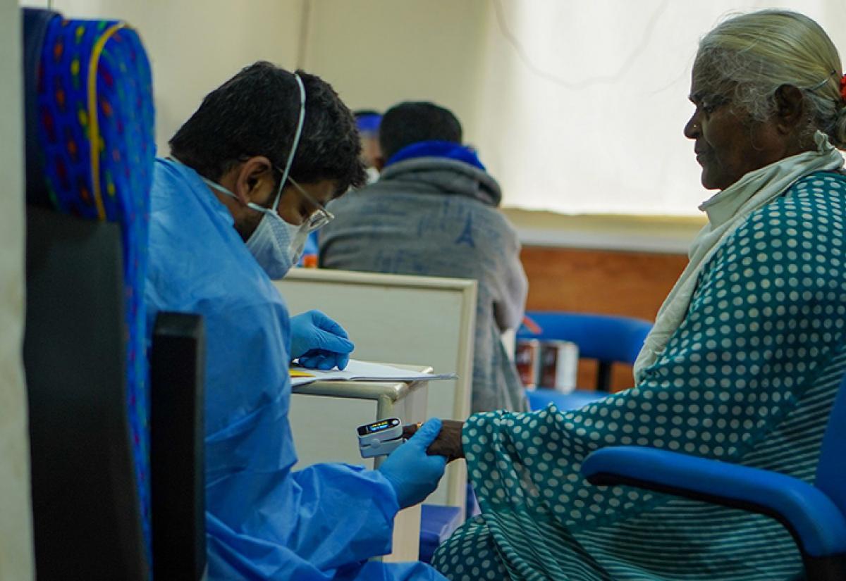 Elderly woman in India in a medical environment