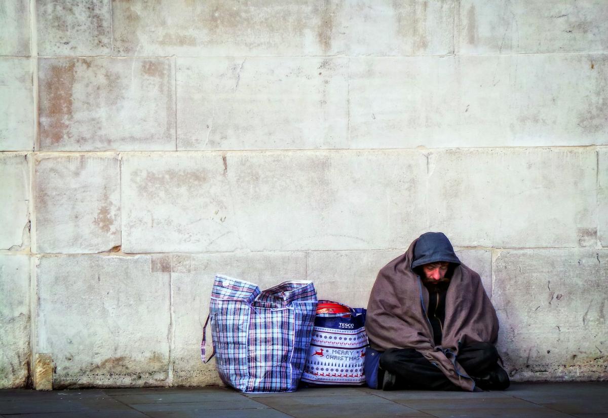 Image: 'Homeless by a Wall', by Garry Knight
