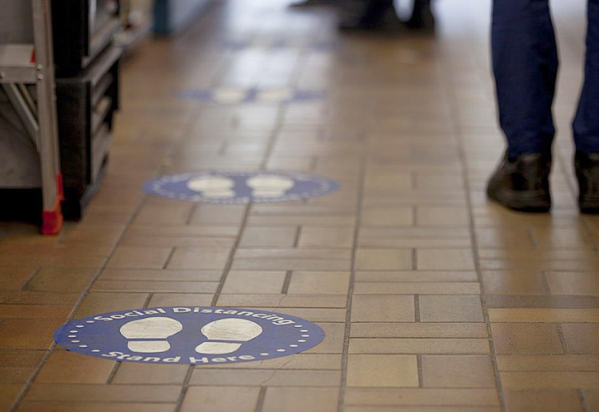 Social distancing signs in London
