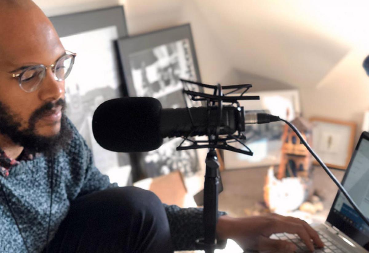 Suta recording the podcast remotely.