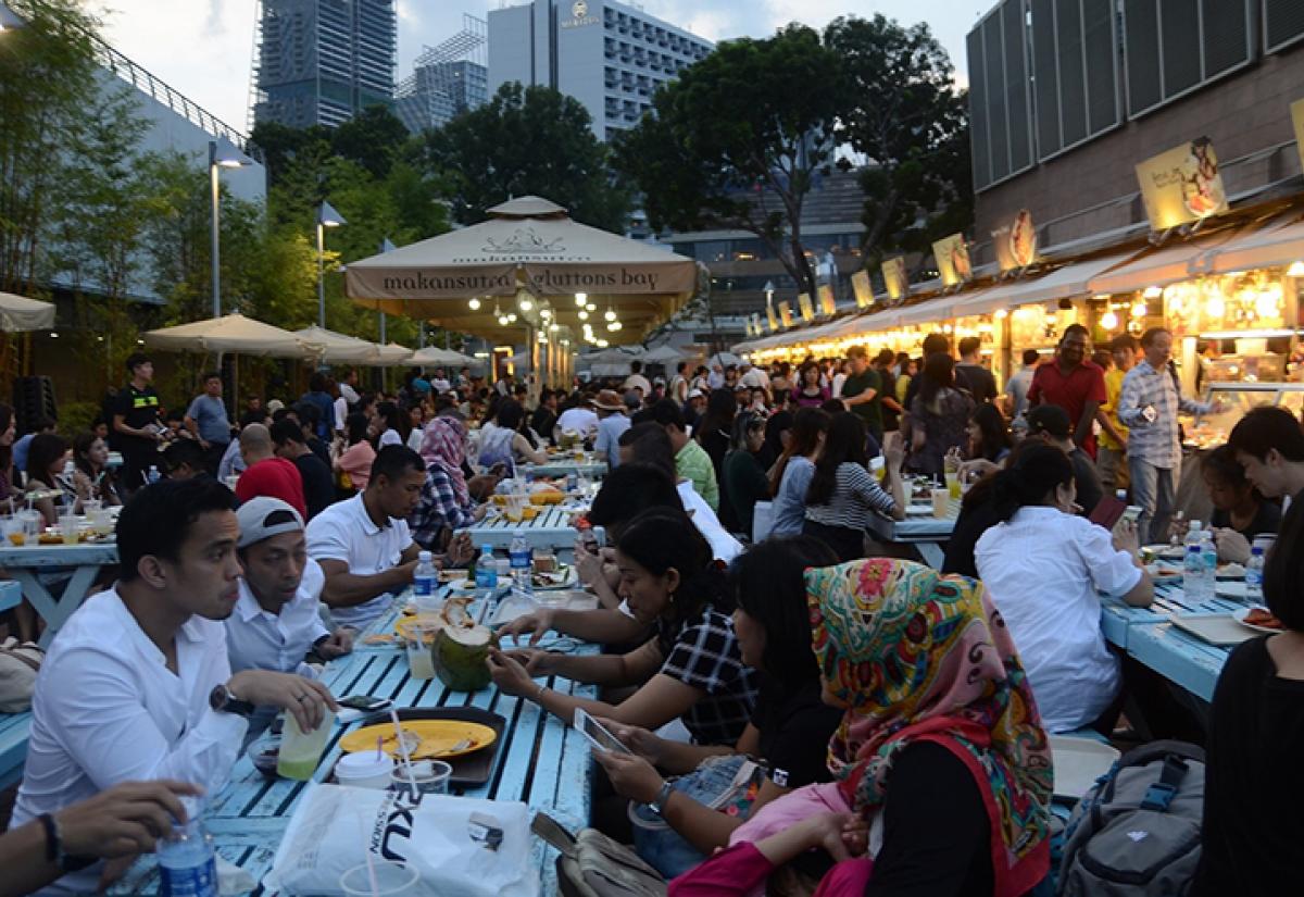 People dining outdoors in Singapore