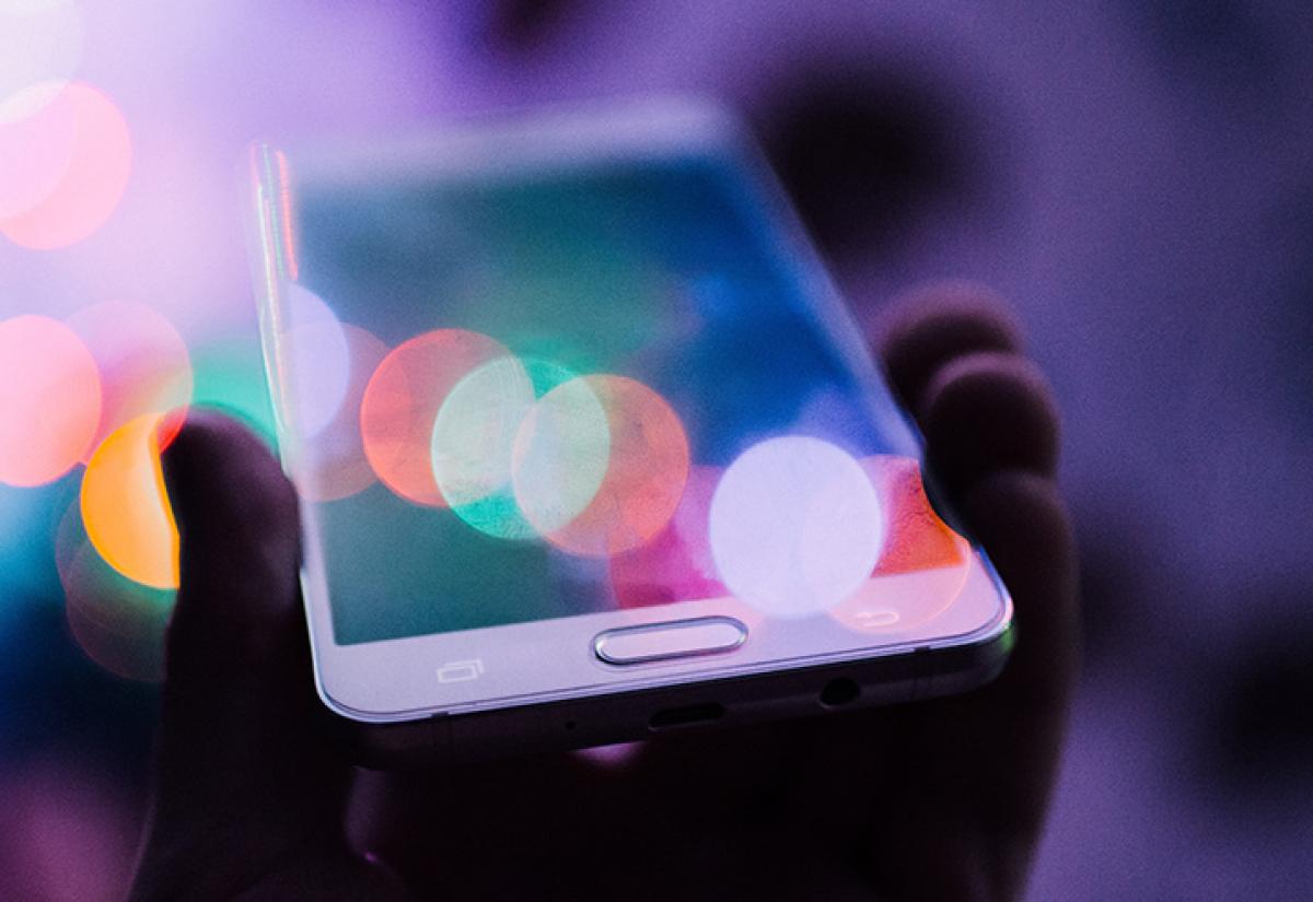 Hand holding smartphone