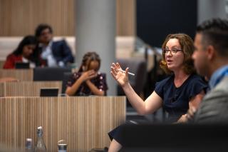Emily Jones teaching in the lecture theatre