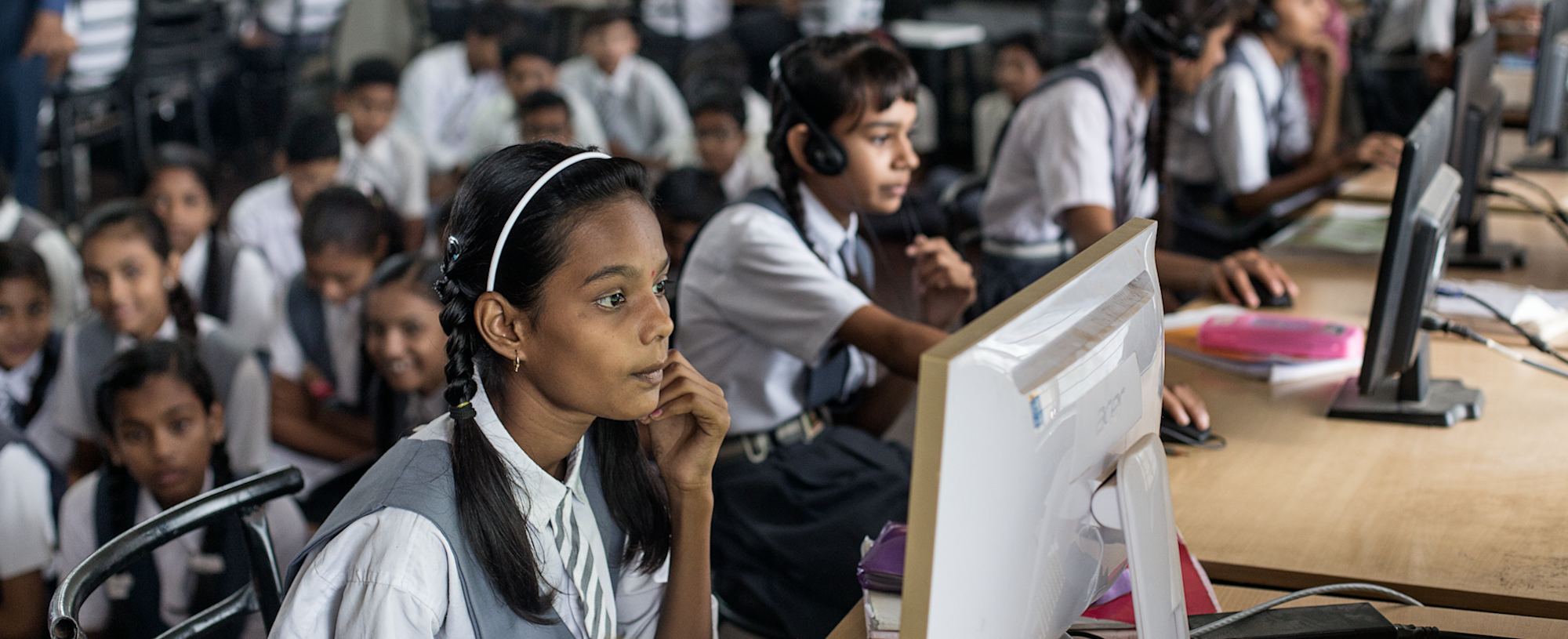 Schoolchildren in the classroom using computers