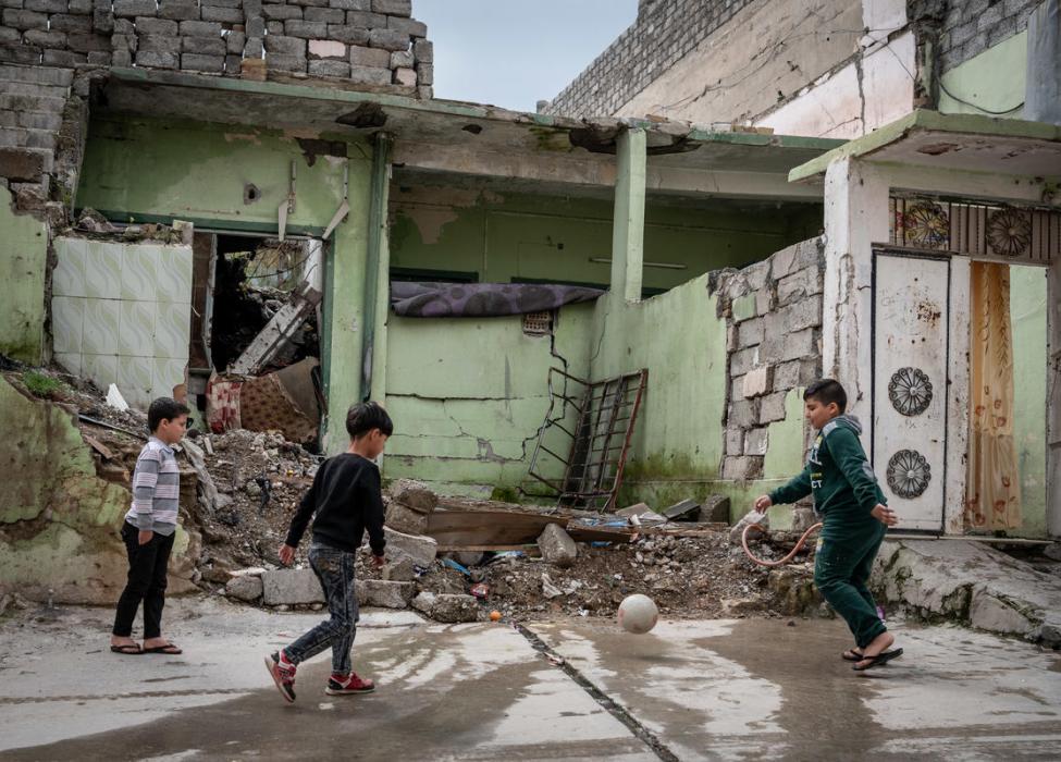 Children playing football in Iraq