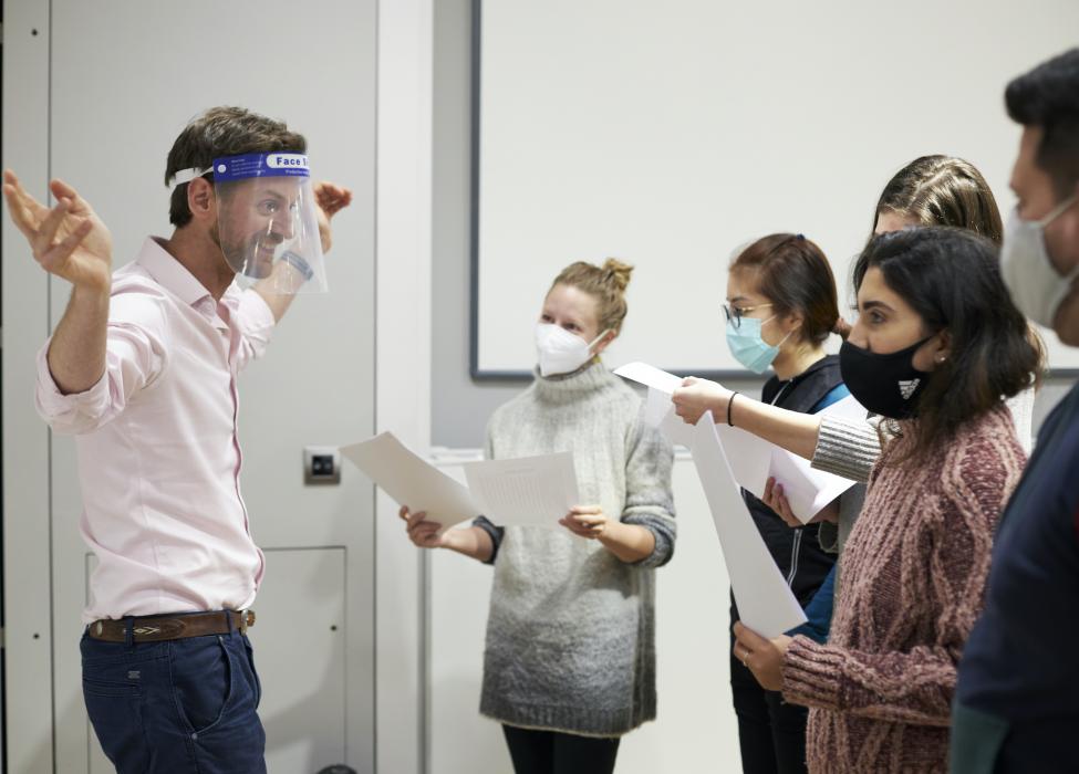 Dr Adam Webster and MPP students in masks 