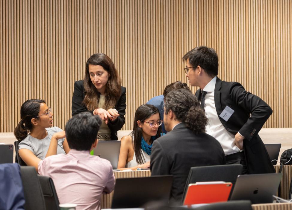 Seven students in a discussion group