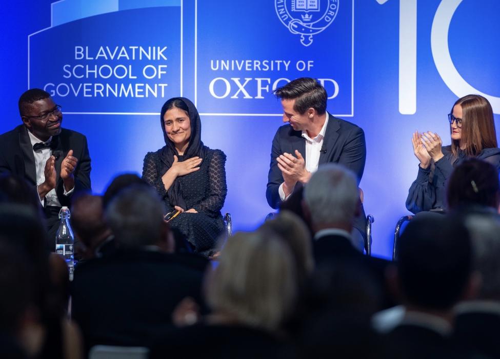 Left to right: Dapo Akande applauds Shabana Basij-Rasikh, as does Byron Fay and Soledad Nunez