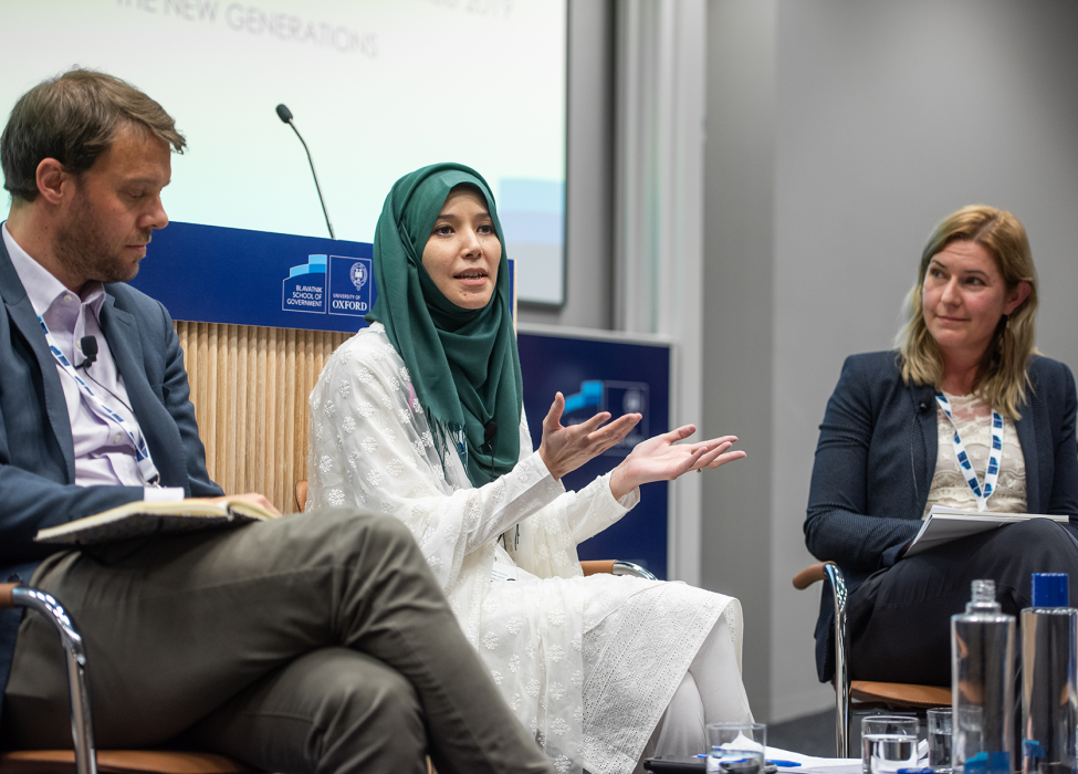 Batool speaking alongside two other panellists at the Challenges of Government Conference